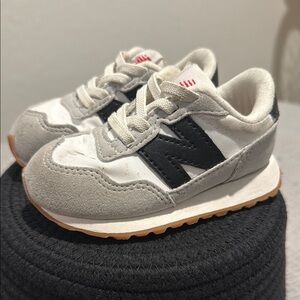 New Balance Kids' White and Black Sneakers